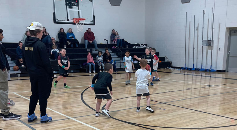 Kenowa Hills Boy's Basketball Slide 1